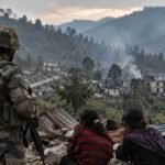 Checkpoint Overlooking a Smoke Filled Village compressed 1